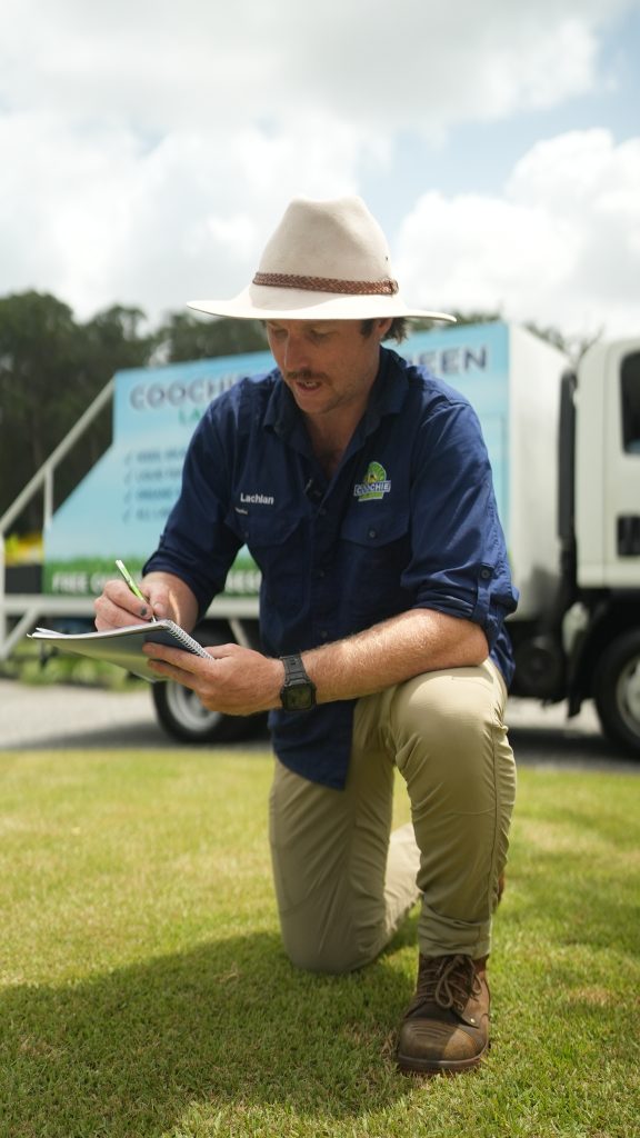Lawn Repair in Victoria: How to Revive Your Melbourne Lawn and Keep It Thriving All Year 2 Coochie HydroGreen technician performing a free lawn assessment in a Melbourne suburban backyard