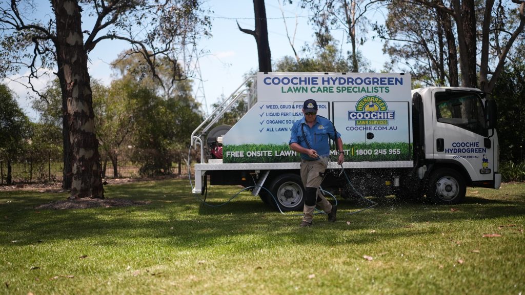  Lush green Australian backyard lawn treated by Coochie HydroGreen professional lawn care technician